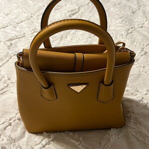 Yellow purse with wallet/smaller hand purse